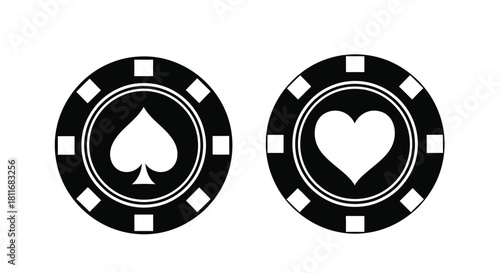 Two black and white casino chips with spade and heart symbols displayed