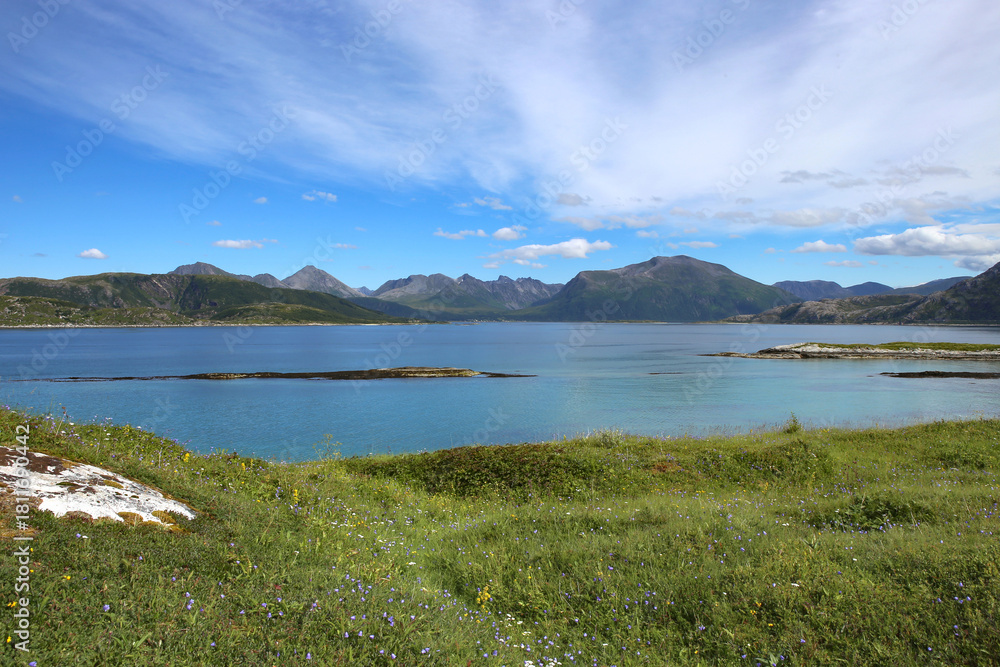 Fototapeta premium Atlantic shore near Sommarøy, Norway. Stunning and idyllic Sommaroya islands landscape by the turquoise sea like caribean.