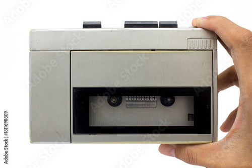 Gray analog cassette tape audio player and recorder, isolated on white. An old-fashioned technology for enjoying good music.