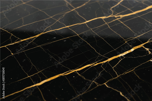 Elegant black marble surface with striking golden veins creating a luxurious and sophisticated natural stone pattern