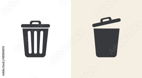 Two dark silhouette icons of a trash can or waste bin for deletion