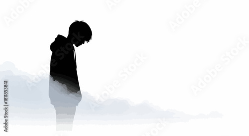 Silhouette of a young person with head down, expressing sadness and introspection.
