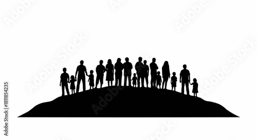 Silhouette of a group of people standing together on a hill.