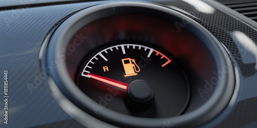 Close up of a car's fuel gauge showing an empty tank with a red needle automobile dashboard