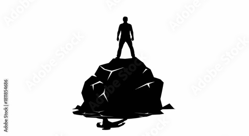 Silhouette of a Man Standing Atop a Rocky Peak.