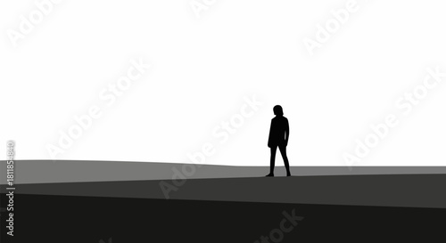 Silhouette of a Lone Figure Standing on a Horizon.