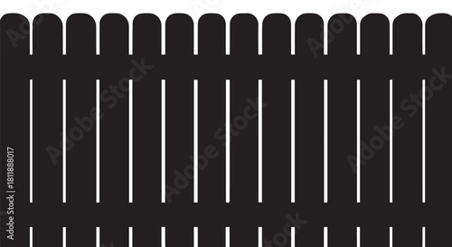 Close-up of a black vertical slat fence pattern forming an architectural barrier.