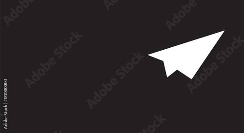 White paper airplane silhouette flying against a dark background, a minimal travel concept image.