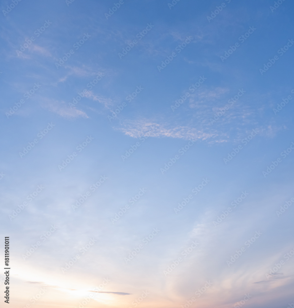 Obraz premium Beautiful morning or evening blue and orange sky with cloudy while sunsets or sunrises taken at the sea used as natural blackground texture