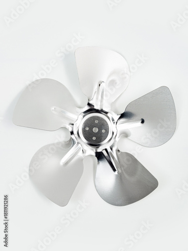 Metal fan blades on a white background.