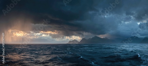 Dramatic seascape with stormy clouds and rain
