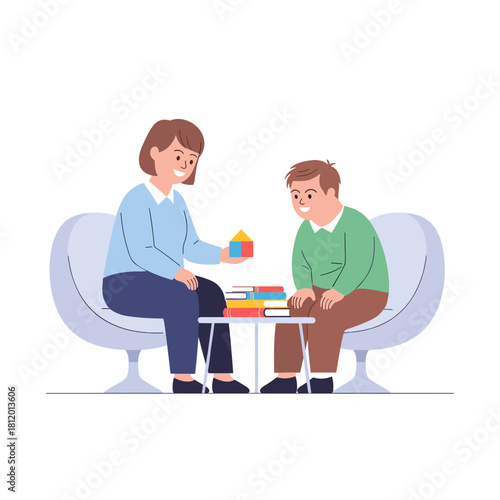Therapist playing with Down syndrome child at table in therapy session  