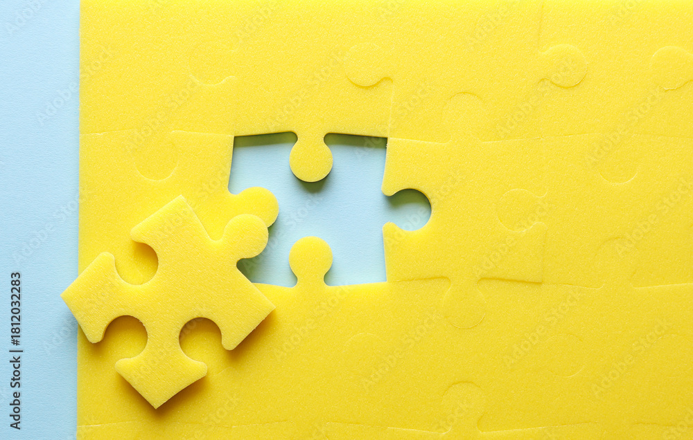 Obraz premium Yellow puzzle pieces. Teamwork, business concept