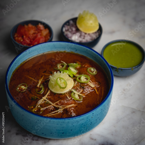 Delicious Spicy Nihari with Ginger and chili lemon Garnish
