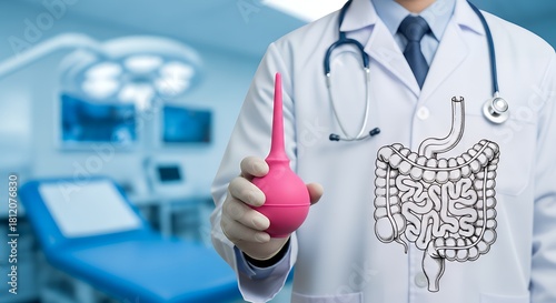 Doctor holding enema bulb with colon illustration in modern operating room