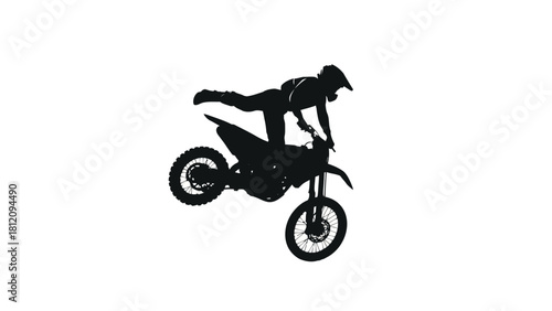 Motocross rider performing a trick on a bike