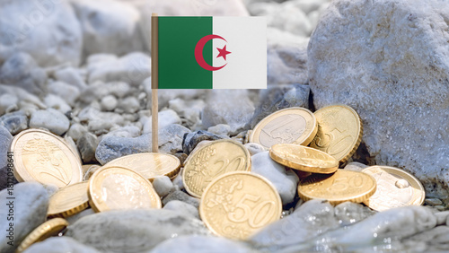 Algerian Flag and euro coins on the riverbank,foreign investment,currency exchange,and international finance connected to Algeria and the European economy.