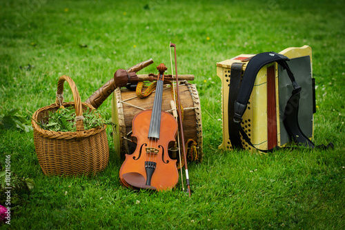 Fotografie Musical instruments placed on the grass during a an annual Latvian festival cele