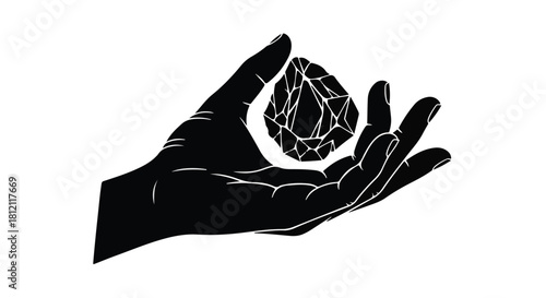 Delicate hand holding a multifaceted gemstone with care and precision