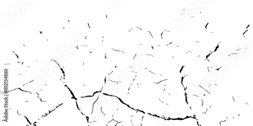 High-contrast cracked earth texture in black and white, featuring bold fractures and abstract dry-soil patterns. Perfect for backgrounds, environmental themes, drought concepts, and graphic design use