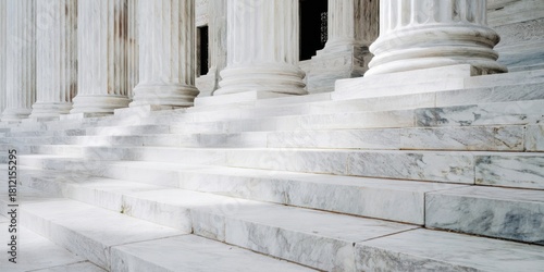 Majestic marble columns and steps of a grand building.