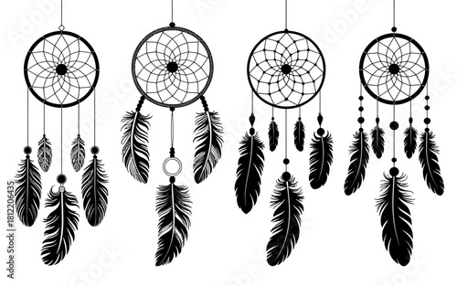 Collection of black and white dreamcatchers with feathers and beads