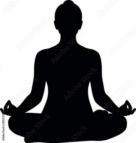 Silhouette of person meditating in lotus pose