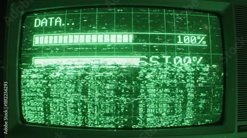 Retro computer screen displaying data transmission with green text