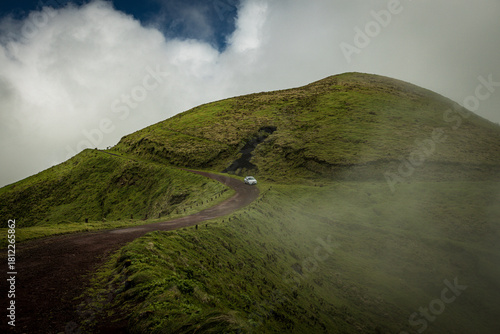 Foggy hills with green grass and the mist at Sao Jorge Island, Azores, Portugal