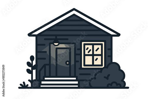 Cozy dark bungalow house exterior featuring an illuminated porch light and surrounding green bushes