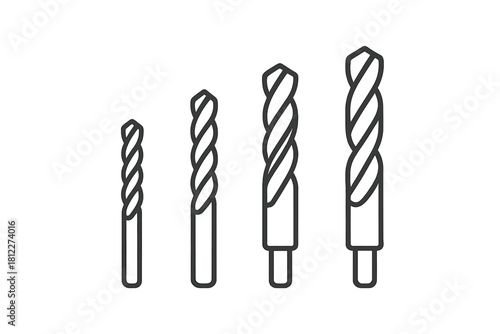 Four different sized spiral twist drill bits for construction and DIY projects