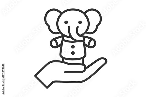 Stylized small elephant doll held gently and carefully in the open palm of a hand