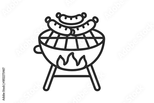 Sausages cooking over hot flames on a small portable charcoal barbecue grill