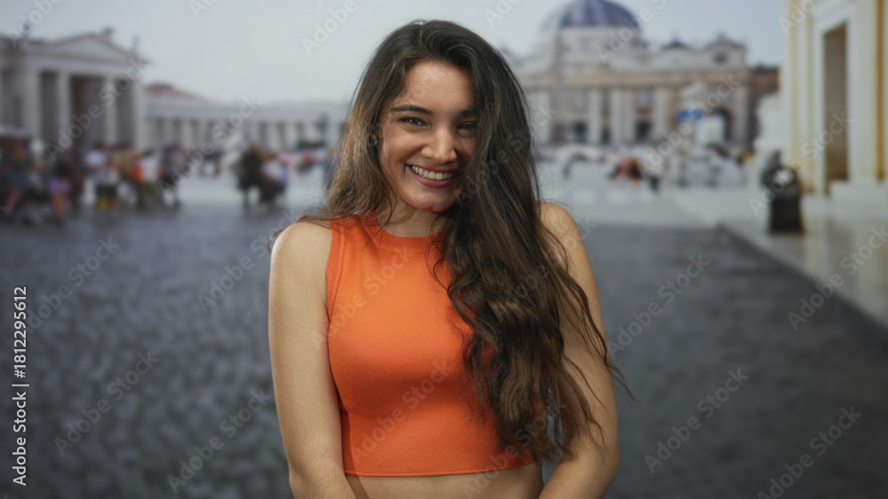 Fototapeta premium Hispanic woman touches hair while standing on crowded sunlit street outside vatican building; serenity calm peace tranquility.