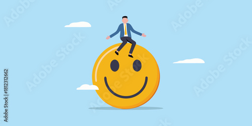 Businessman riding a giant happy face symbolizing success and positivity