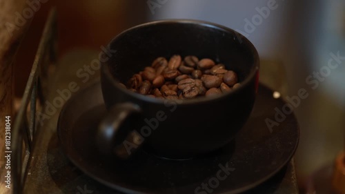 black cup of coffee with beans
