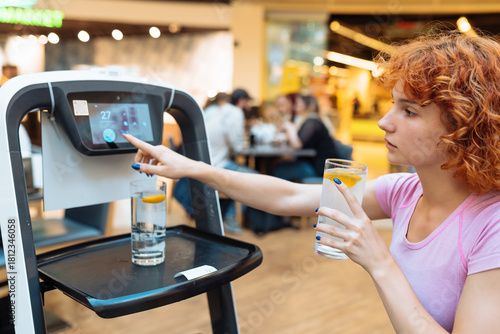 robot waiter delivered drinks to the table