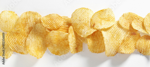 Potato chips on white
