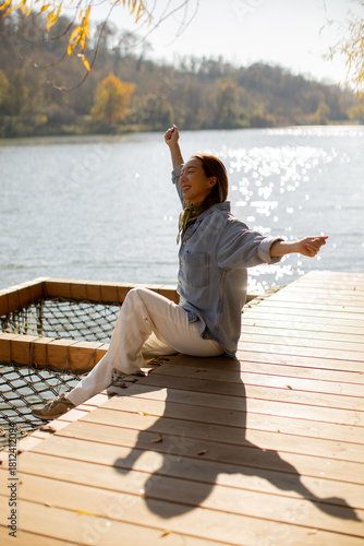 Joyful woman enjoying a sun...