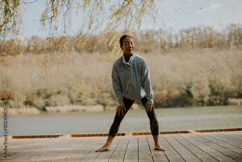 Korean woman practicing yog...