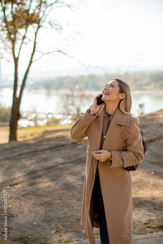 Woman talking on phone whil...