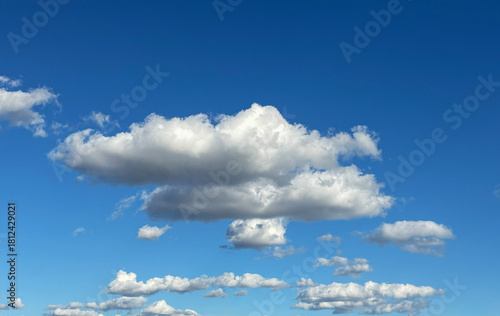 Fluffy Clouds Drifting in a Clear Blue Sky During the Day