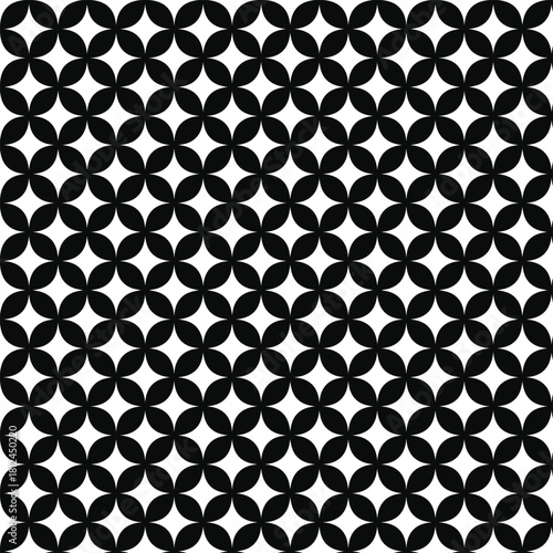 Abstract black and white seamless pattern featuring a repeating geometric star and flower motif. A timeless monochrome background for modern design