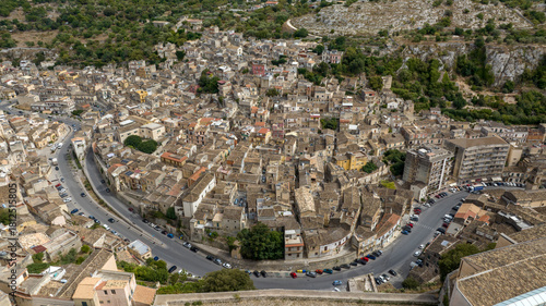 Fototapeta Naklejka Na Ścianę i Meble -  Aerial view of a neighborhood in the lower part of Modica. Modica is a small Italian town located in the hills of the province of Ragusa, Sicily, Italy.