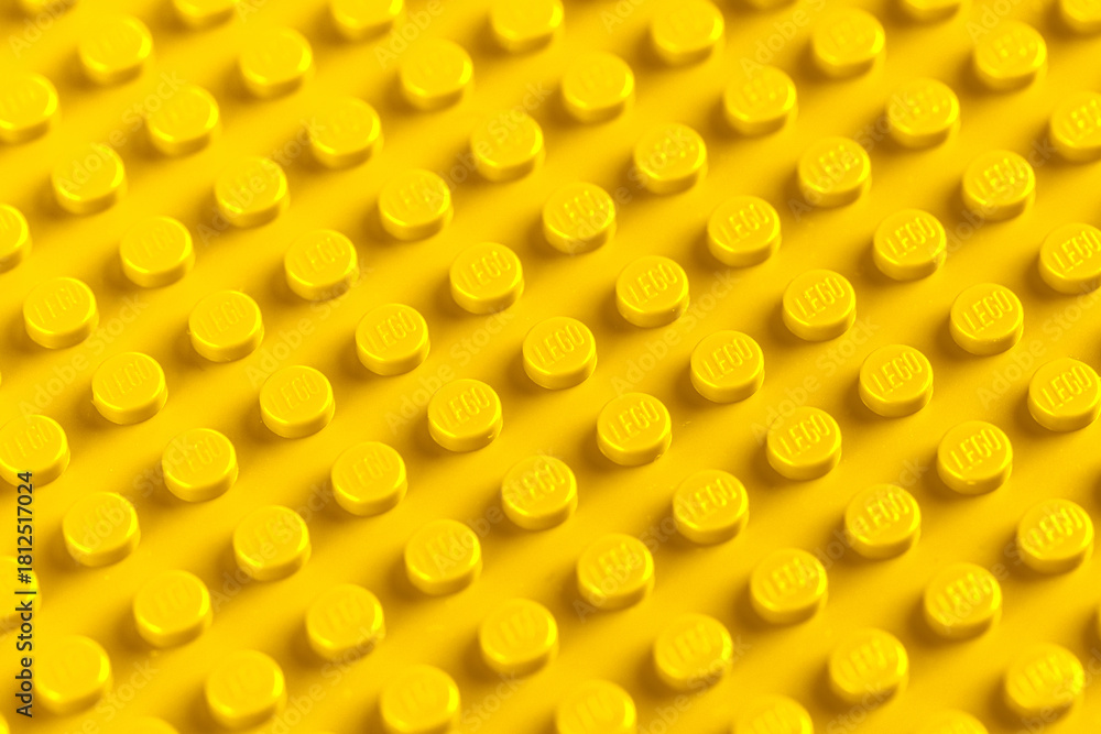 Naklejka premium Lviv, Ukraine - November 16, 2025: LEGO Brick Surface Texture Background