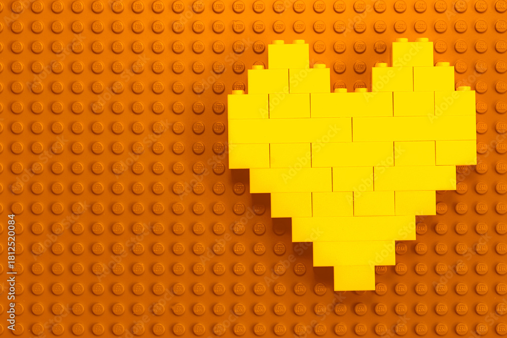 Naklejka premium Lviv, Ukraine - November 16, 2025: LEGO Brick Surface Texture Background