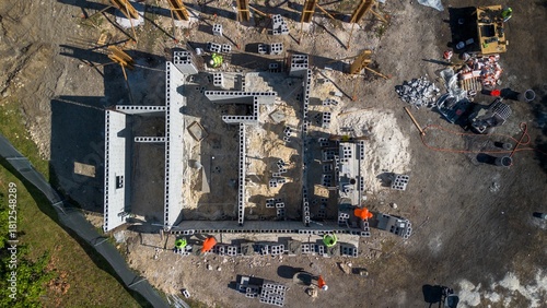 Εκτύπωση καμβά Aerial view of construction site of house foundation with workers building with