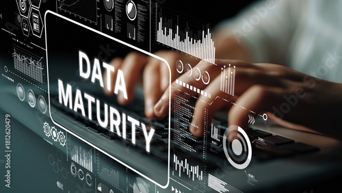 Photos Conceptual illustration of data maturity with digital graphics and hands typing on a keyboard in a modern workspace