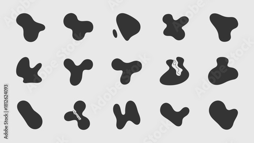 Collection of abstract black shapes and forms with irregular outlines on