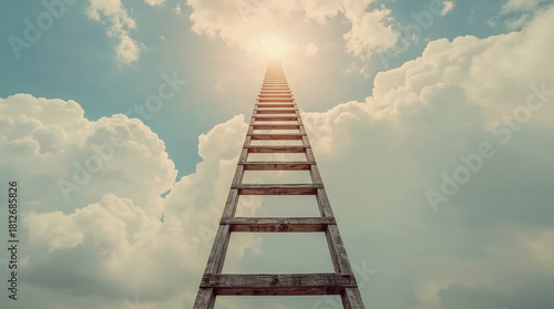 A wooden ladder extends upwards into a cloudy sky, its top disappearing into bright sunlight, symbolizing aspirations and the path to success.